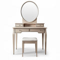 Vanity table set with round mirror and cushioned stool in light beige color